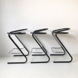 Set of three bar stools black and chrome of Thema Italy to the 1970s