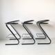 Set of three bar stools black and chrome of Thema Italy to the 1970s
