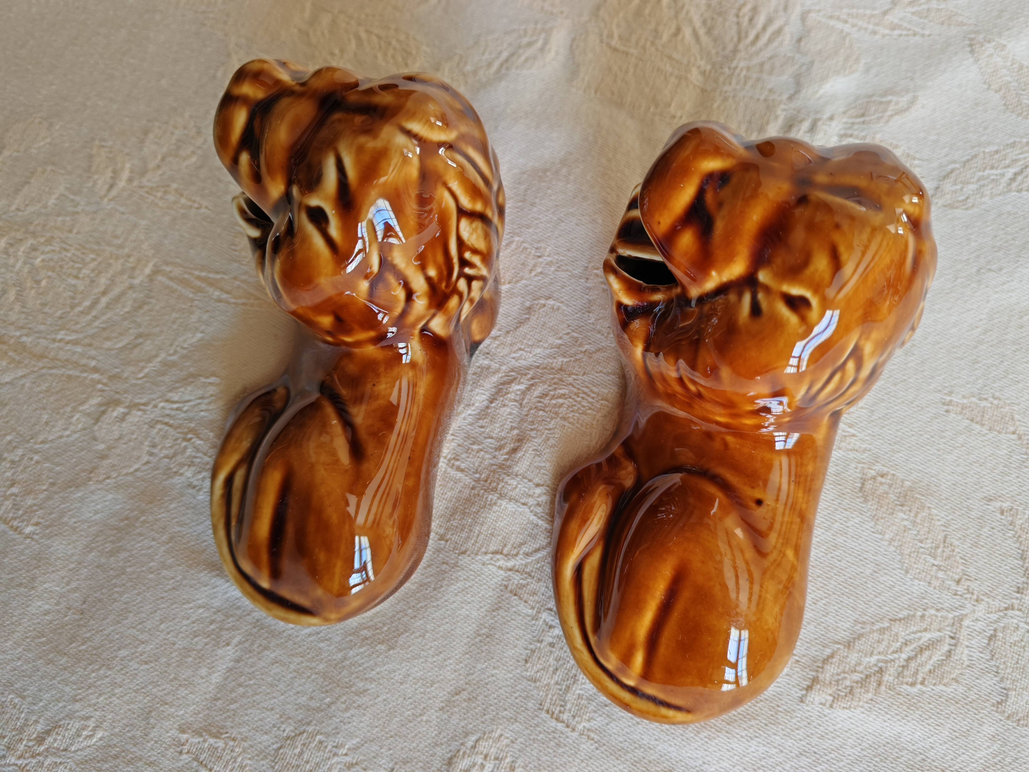 Pair of vintage lion ashtrays