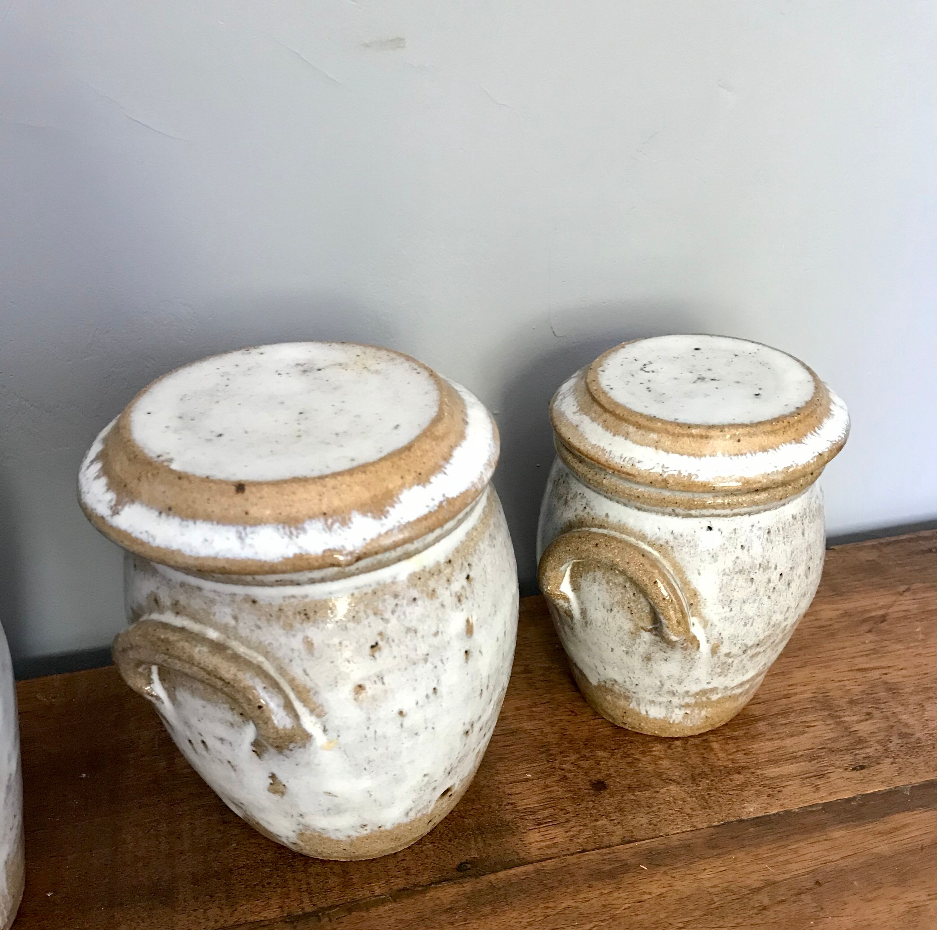 Suite of antique enamelled ceramic pots