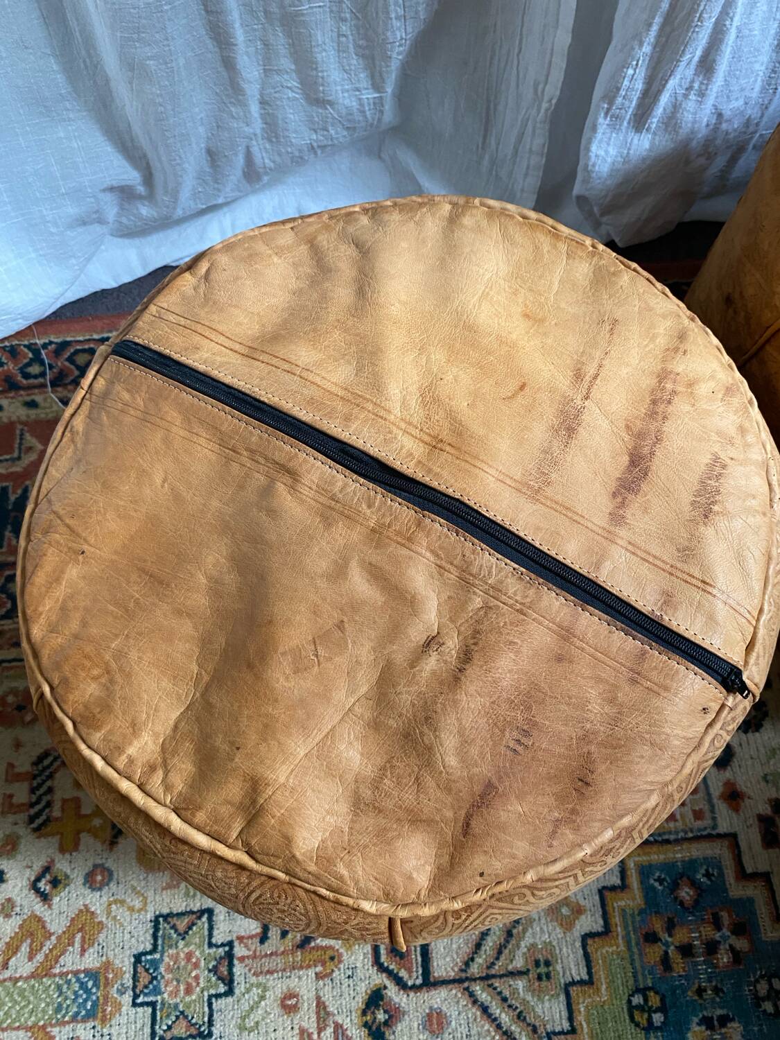 Pair of leather poufs