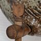 fountain in pyrity sandstone and vintage rope