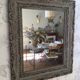 Antique patinated mirror