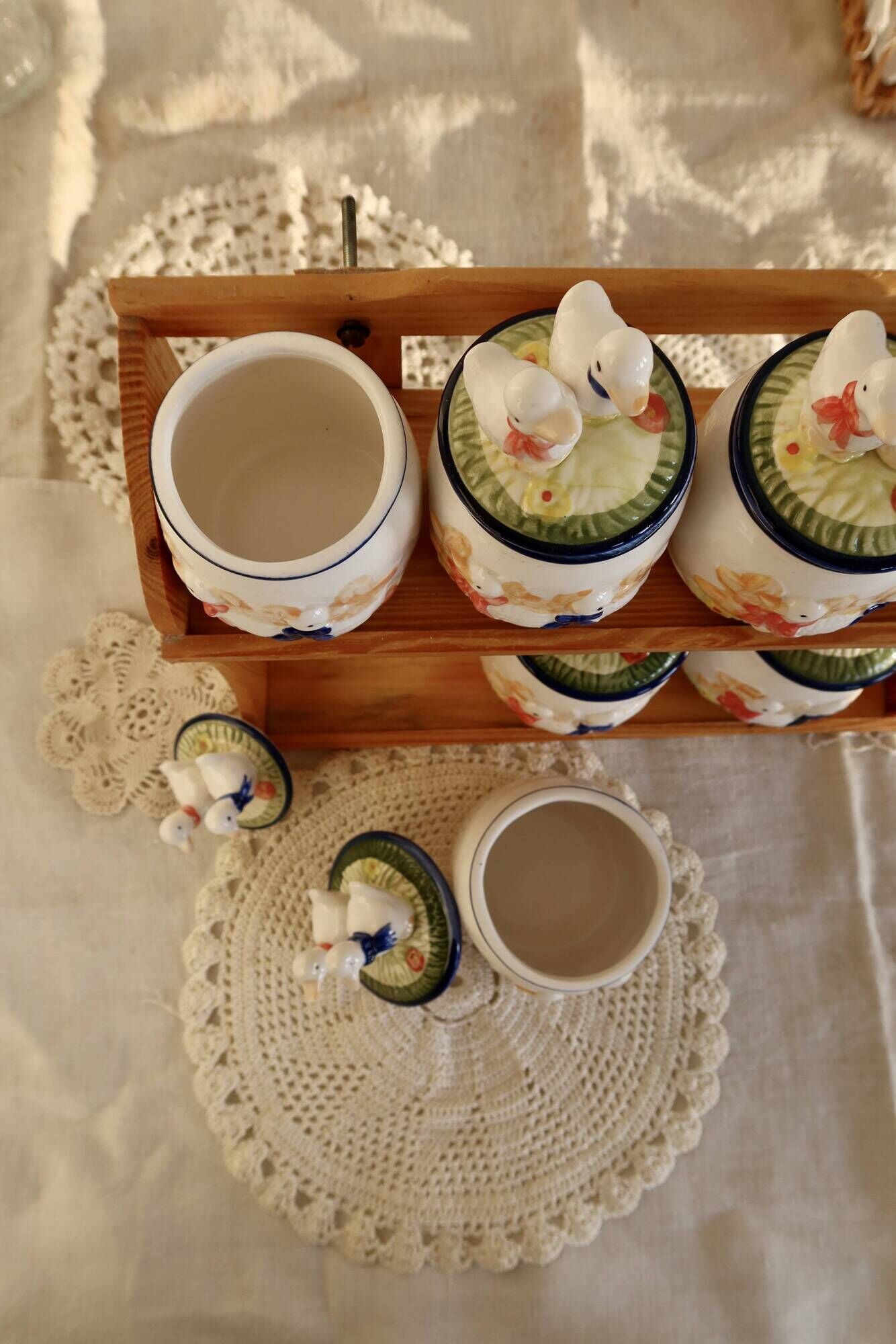 Vintage wooden wall condiment shelf and porcelain pots with geese slip pattern