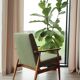 Fauteuil vintage bouclè vert sauvage conclu par H.Lis