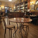 Round marble table with wrought iron base from the mid-20th century.