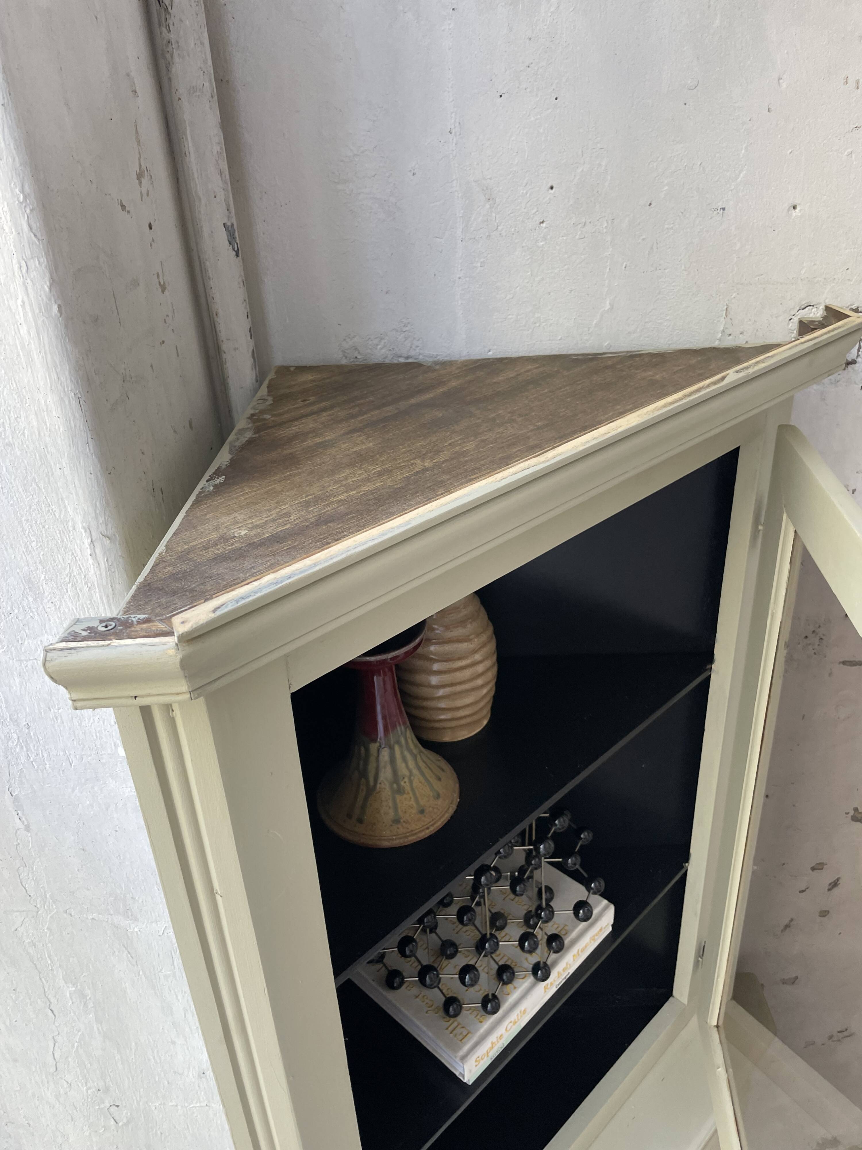 Corner display cabinet from the 1950s