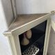 Corner display cabinet from the 1950s
