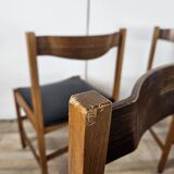 Six Scandinavian-style teak and leather dining chairs