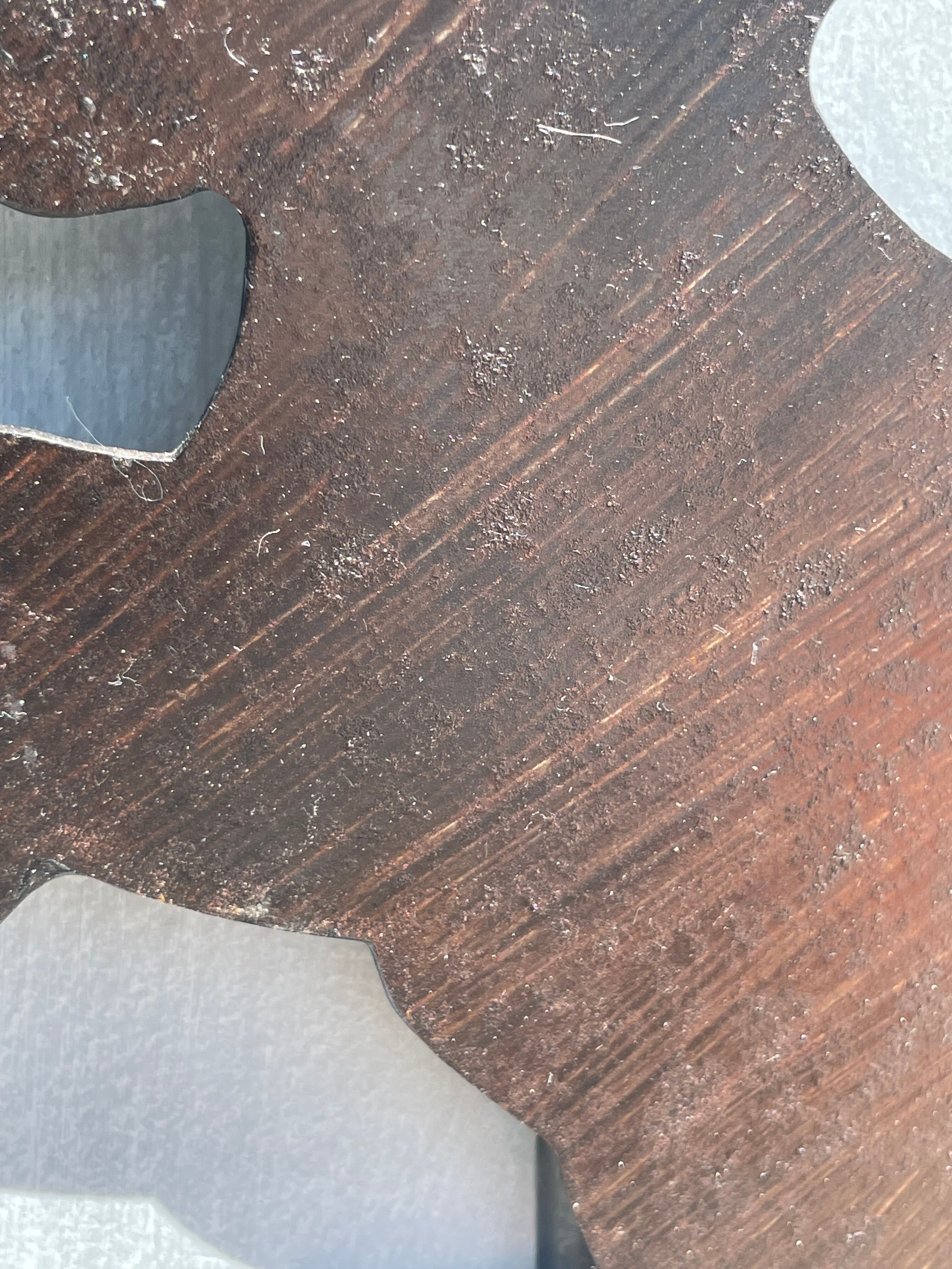 Cast iron plate in the shape of rabbits