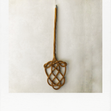 Braided wicker carpet beater