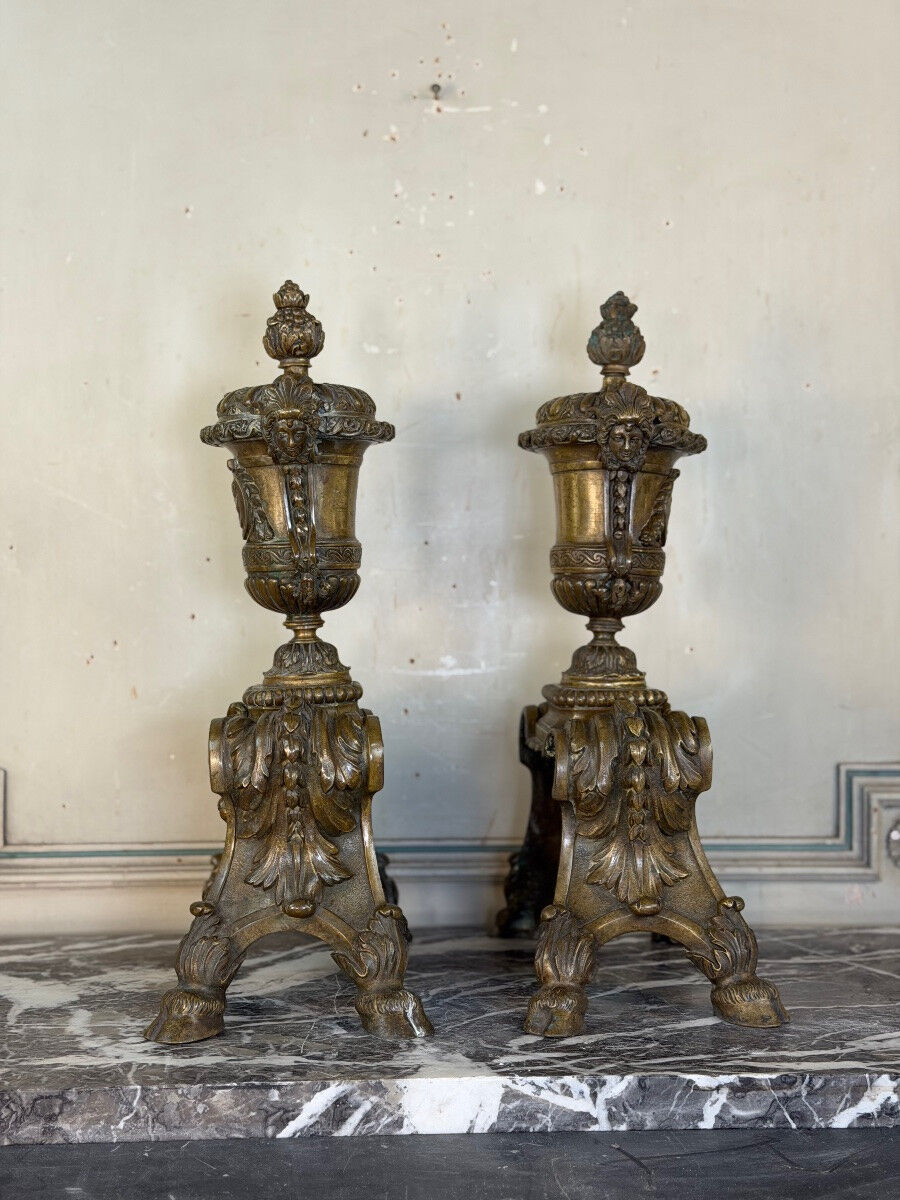 Pair of Louis XIV style andirons in bronze after a design by André-Charles Boulle.