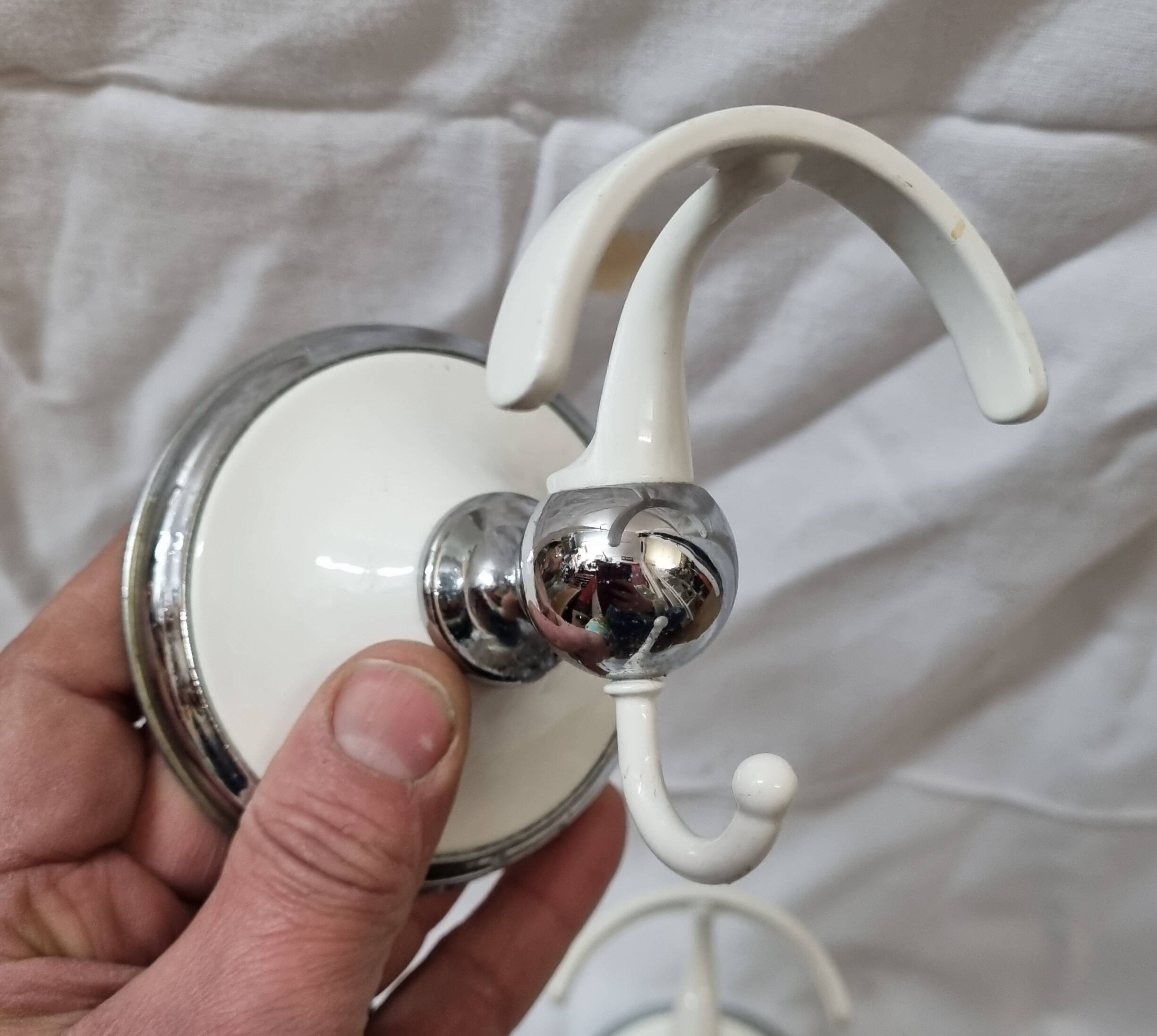 White metal and stainless steel coat hook, 1970/80