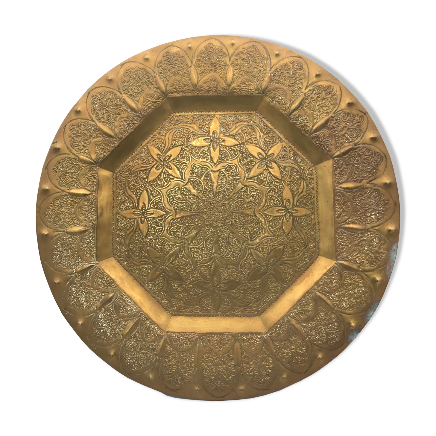 Oriental brass tray with chiseled decoration of arabesques and flowers