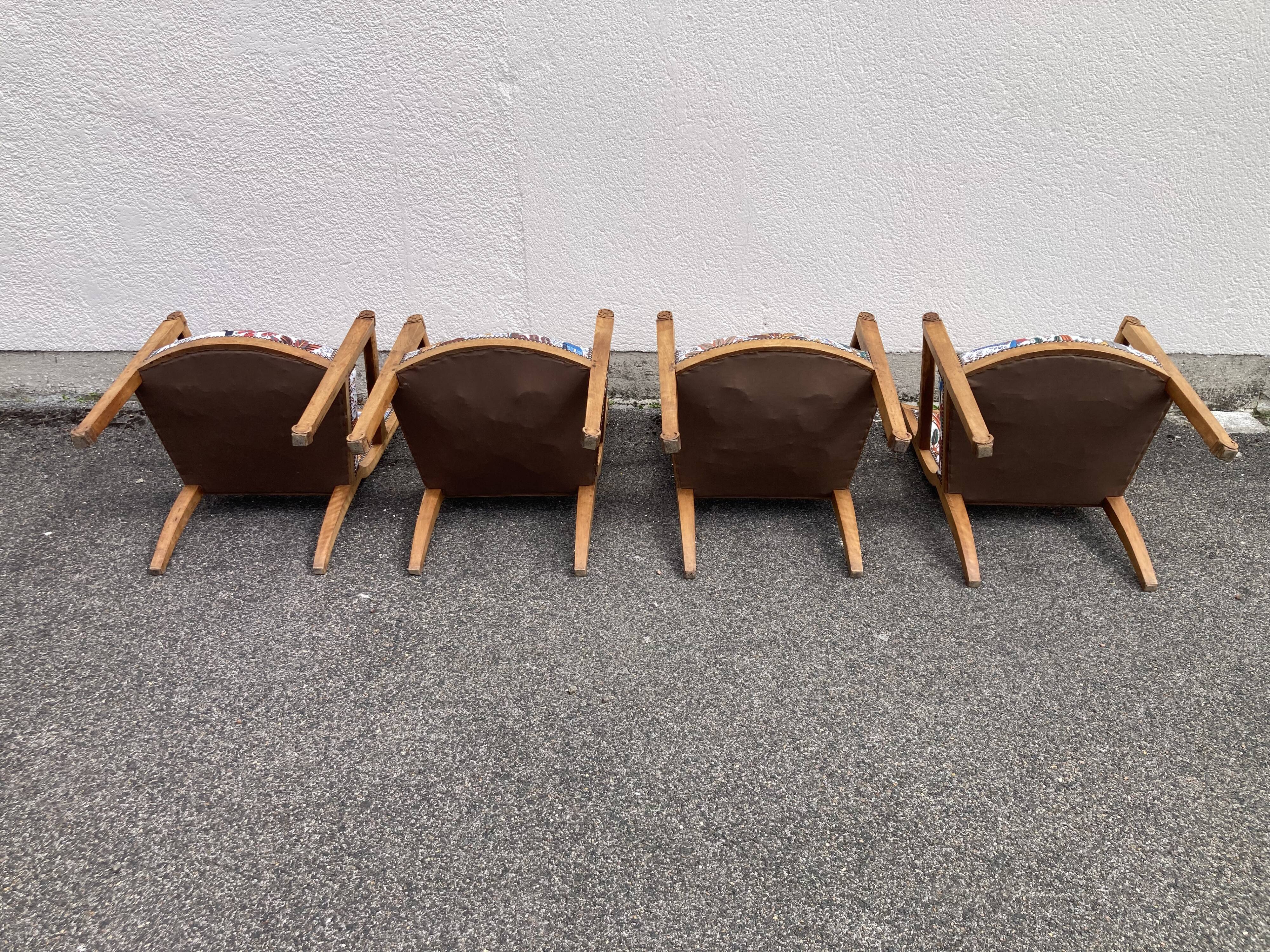 Set of four reupholstered Directoire period armchairs.