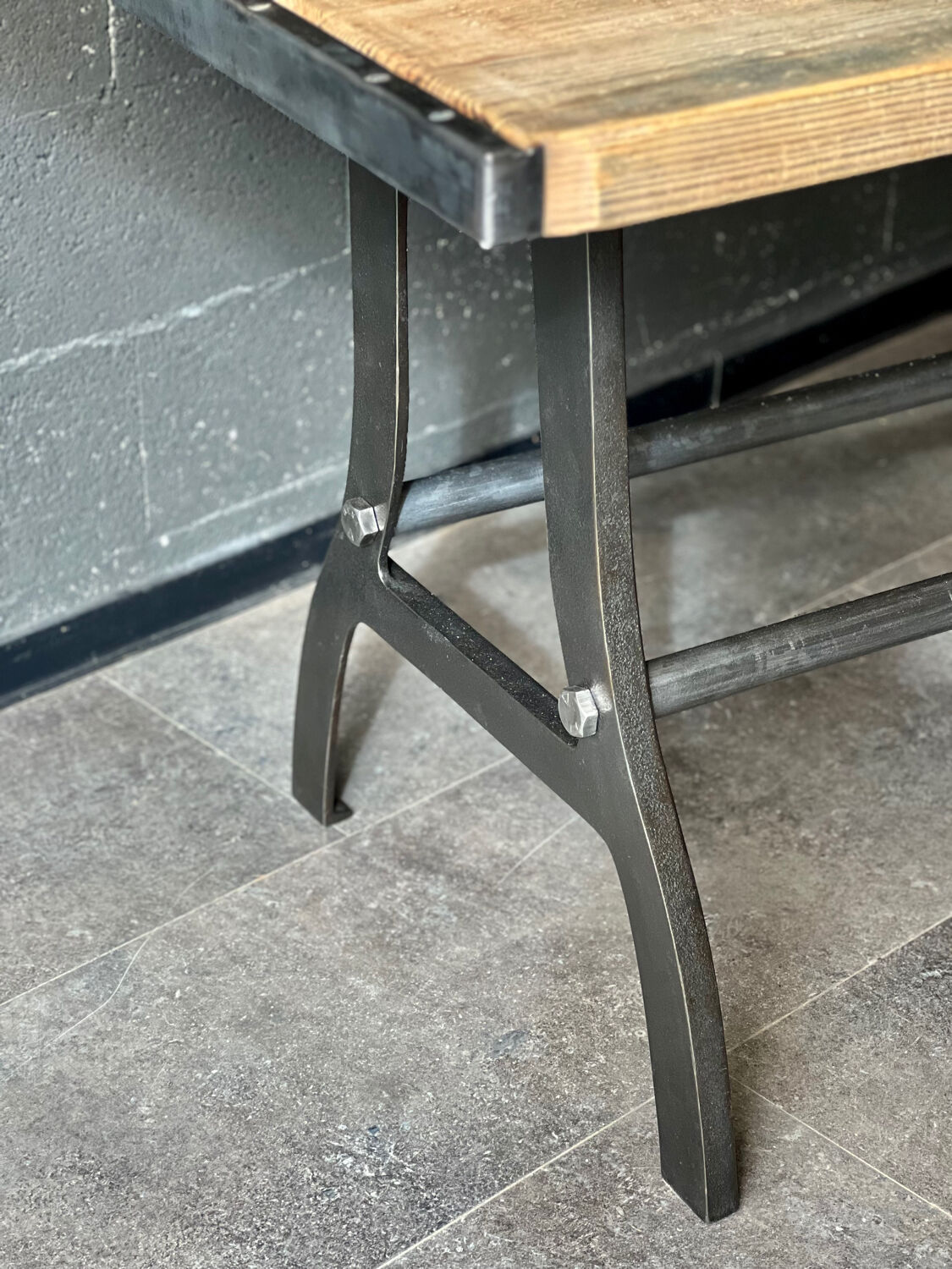 Industrial table with cast iron legs