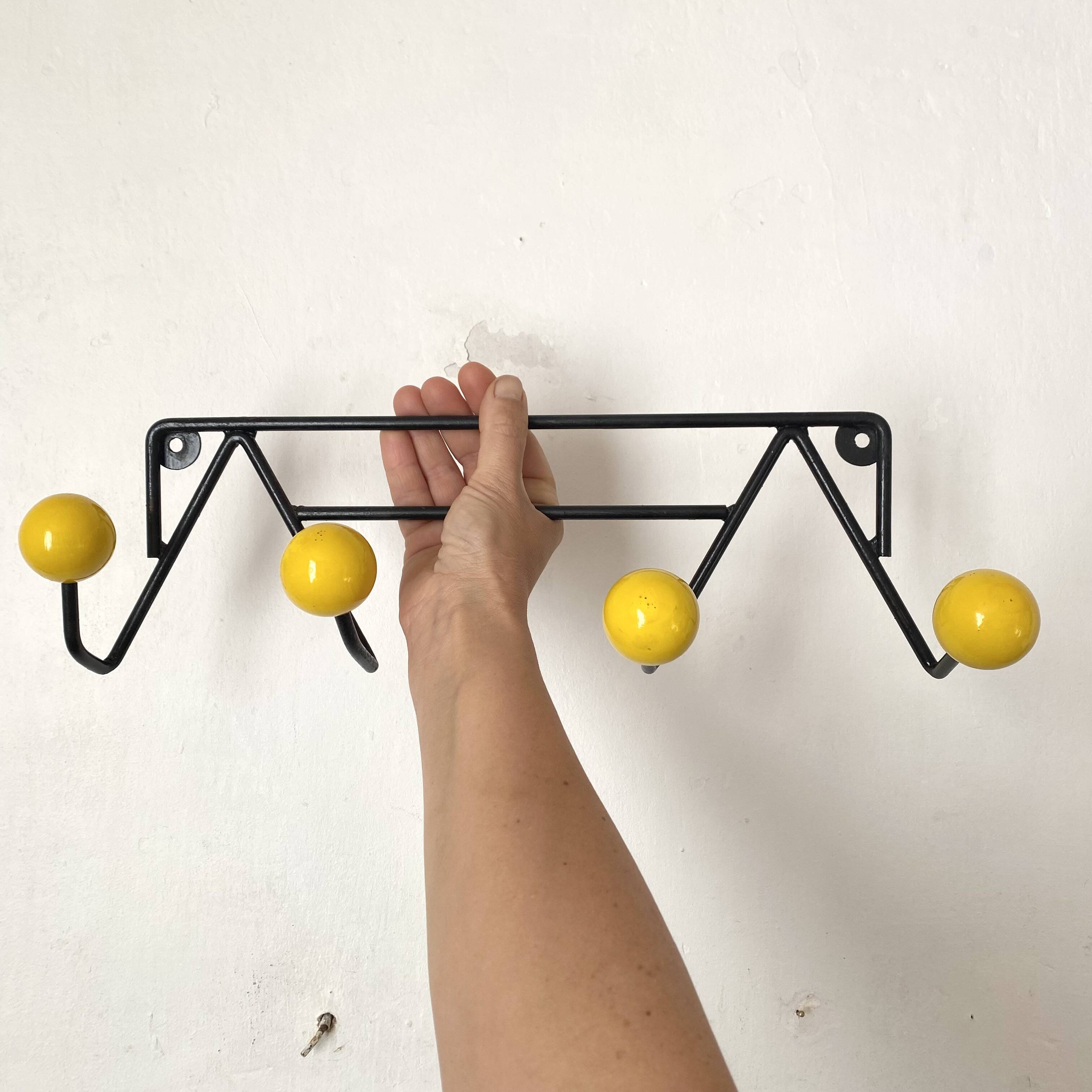 Vintage coat rack with ball hooks in Feraud style.