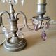 Pair of girandole lamps and silver metal