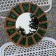 Miroir soleil en céramique des années 70