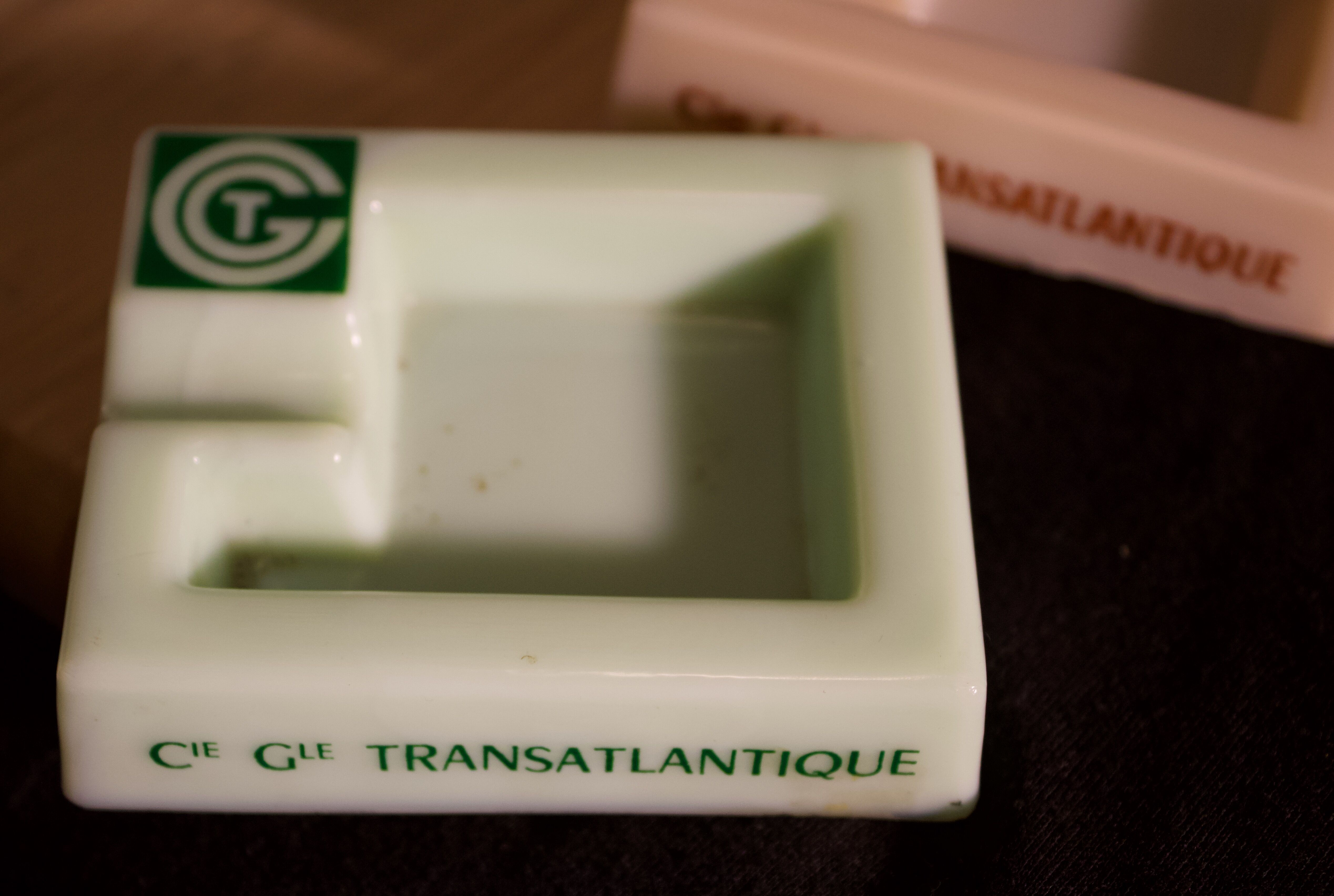 Three opalex ashtrays at the Logo of the Trans-Atlantic General Company - French Line - Model created by Jean Luce for the cruises of the liner Normandy and France