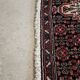 Tapis persan ancien laine tons rouge noué main