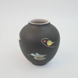 Small black ceramic vase with abstract fish and wave pattern