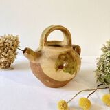 Small Provençal goat jug in creamy white and green enamelled stoneware