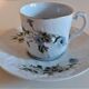 Tasse et sous-tasse en porcelaine décor aux marguerites 1900