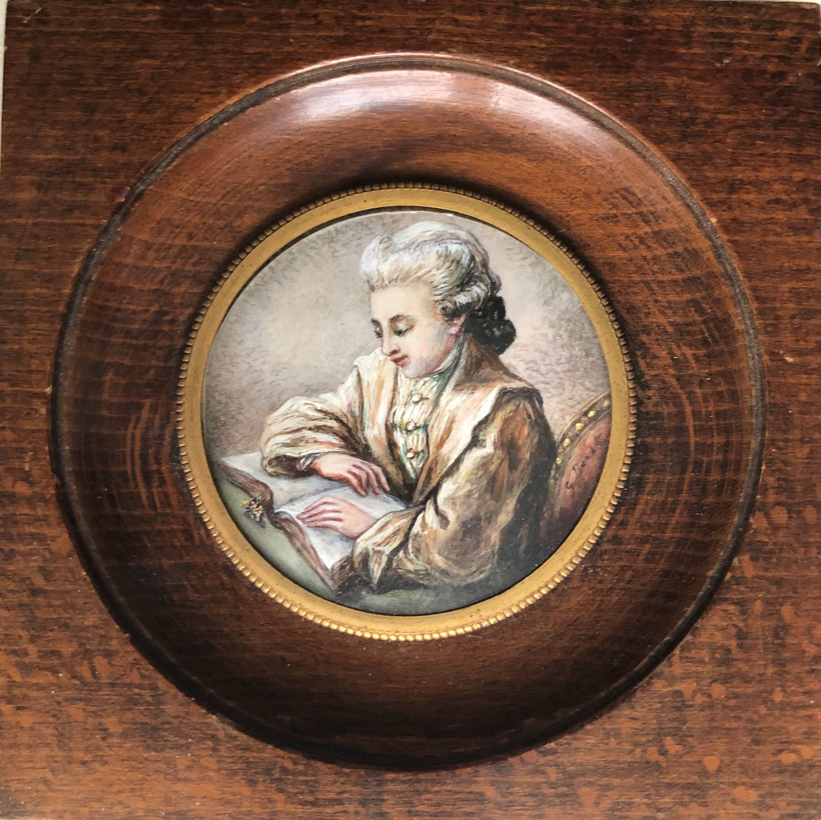 Miniature oil on ivory: Young reader