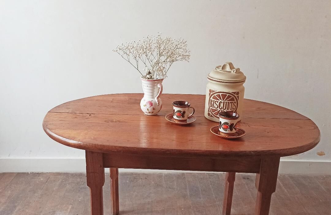 vintage oval dining table made of solid wood