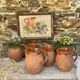 set of terracotta jugs country style