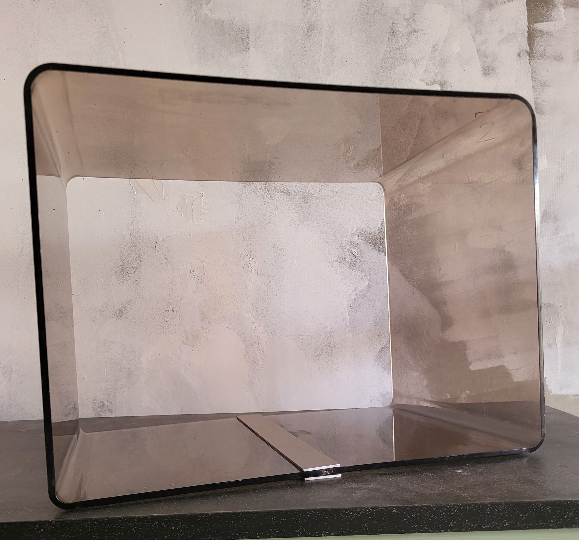 Rectangular piece of furniture or coffee table in smoked plexiglass by Michel Dumas.