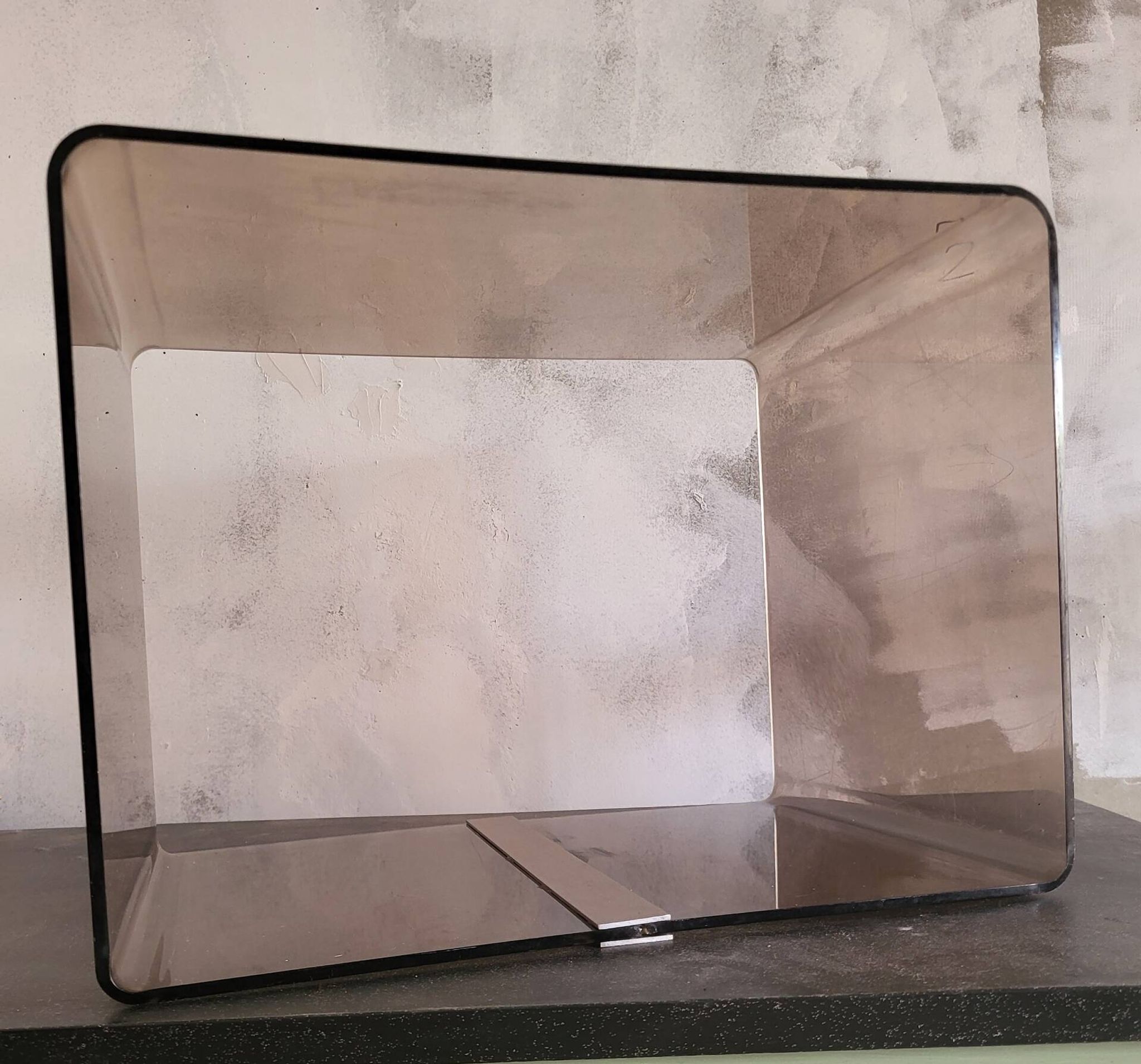 Rectangular piece of furniture or smoked plexiglass coffee table by Michel Dumas.