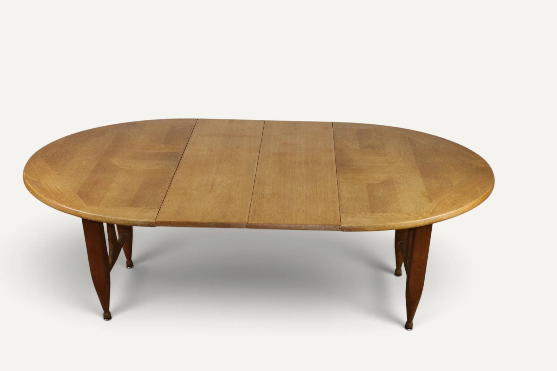 Extendable dining table in oak by Guillerme and Chambron - 1960s