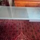 Glass and metal desk with wheels