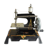 Baby sewing machine years 20-30