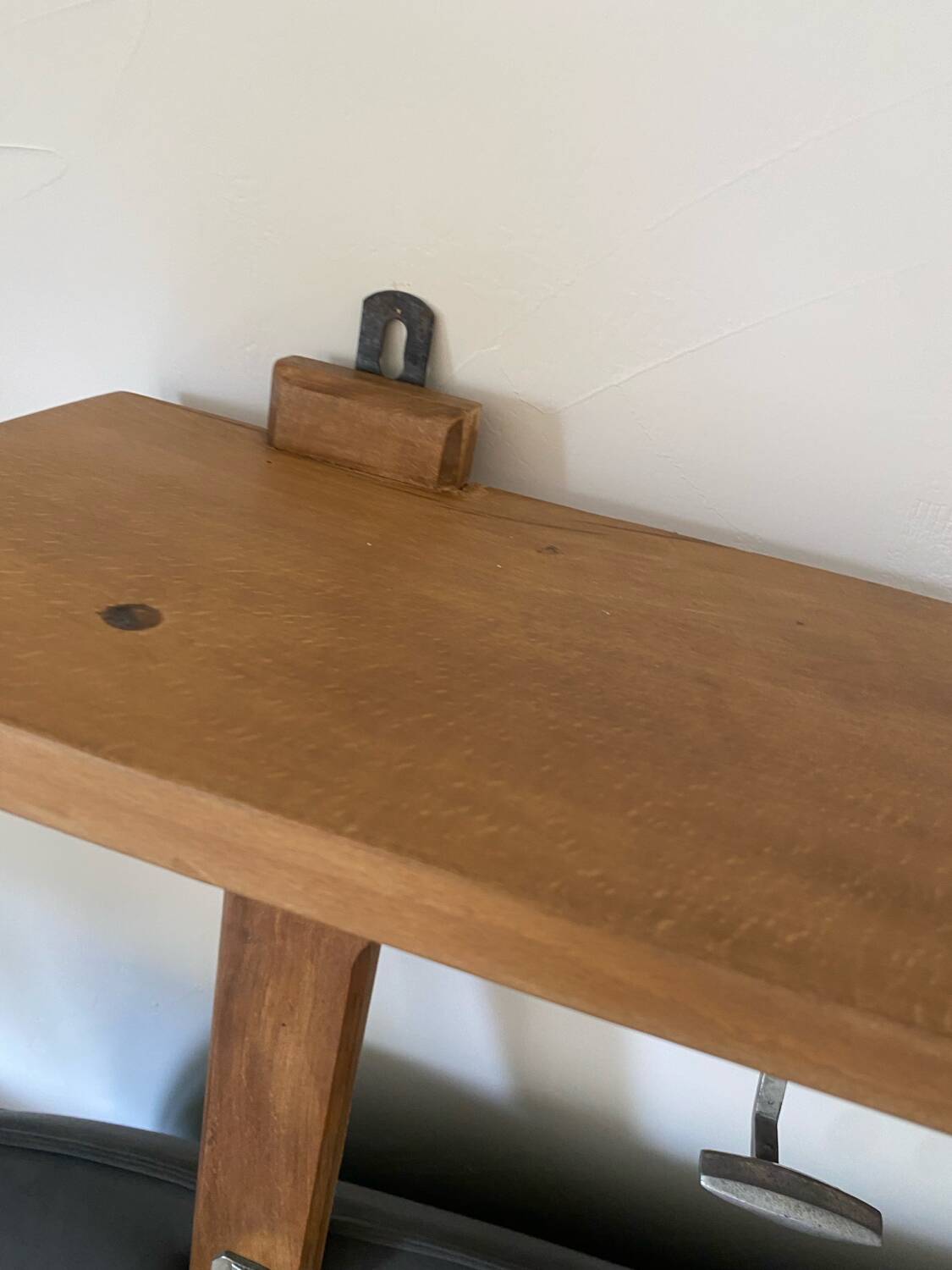 Wall-mounted coat rack with vintage hooks