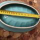 Art Deco ceramic pocket vase in celadon green and gold, style Arthur Percy L34/P22.