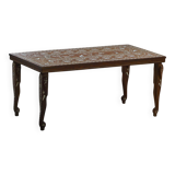 Vintage Indian teak coffee table inlaid with elephant motifs, mid-20th century.