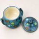 Vintage ceramic soup tureen with floral decoration.