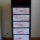 Chest of drawers in black and toile de Jouy