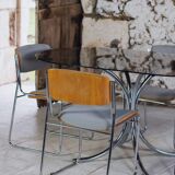 Oval dining table in chrome and smoked glass, 1970.