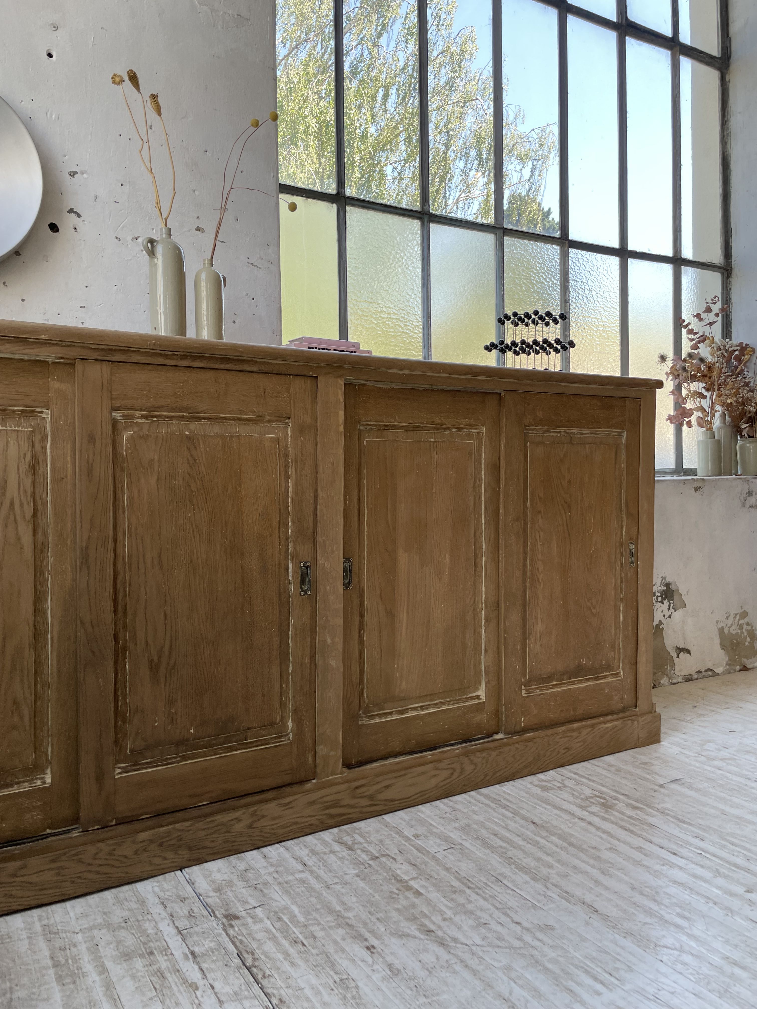 Large row of solid oak loom sliding doors