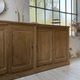 Large row of solid oak loom sliding doors