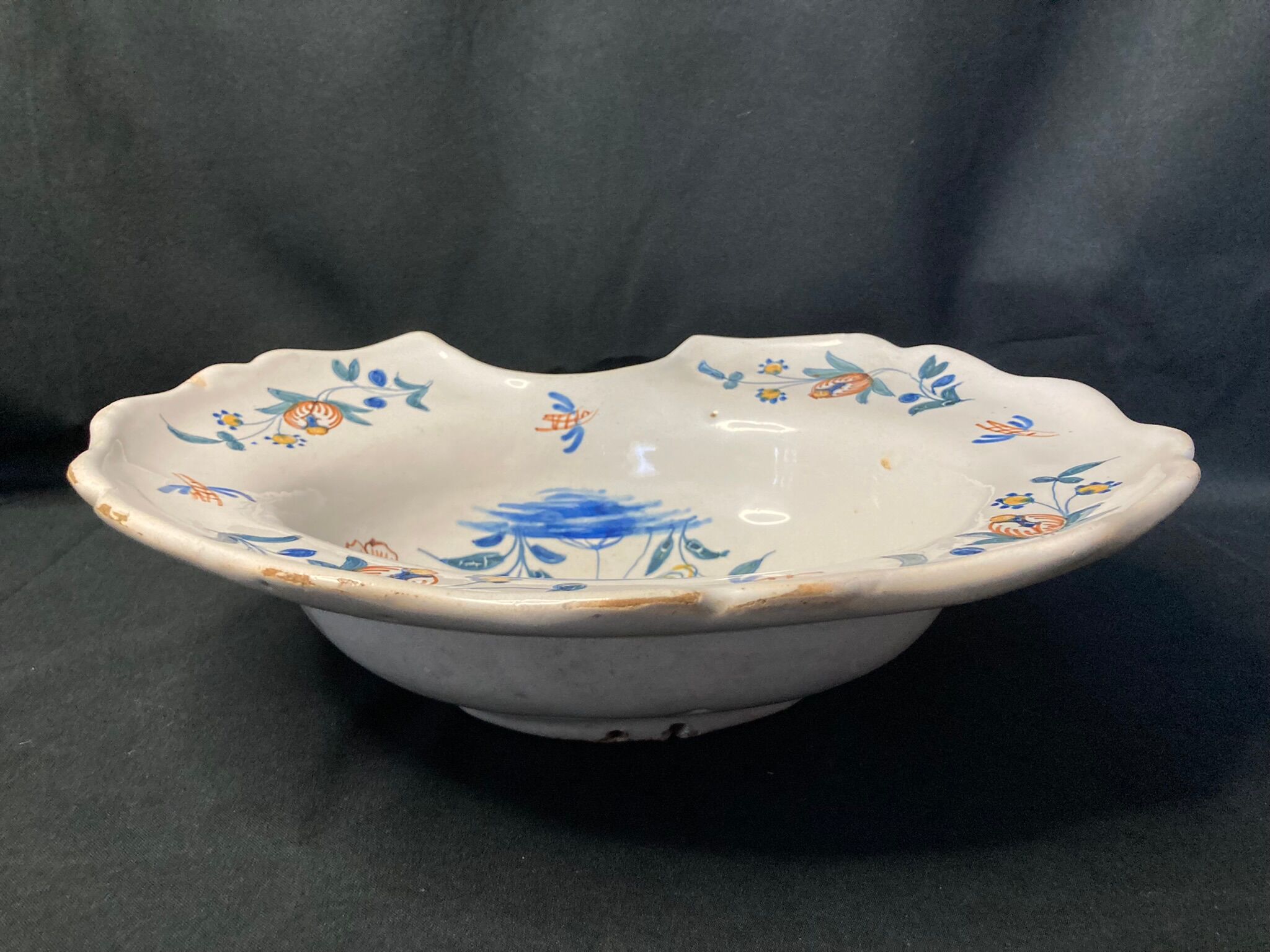 Antique polychrome earthenware shaving dish from La Rochelle, 18th century