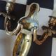 Pair of gilt bronze caryatid sconces
