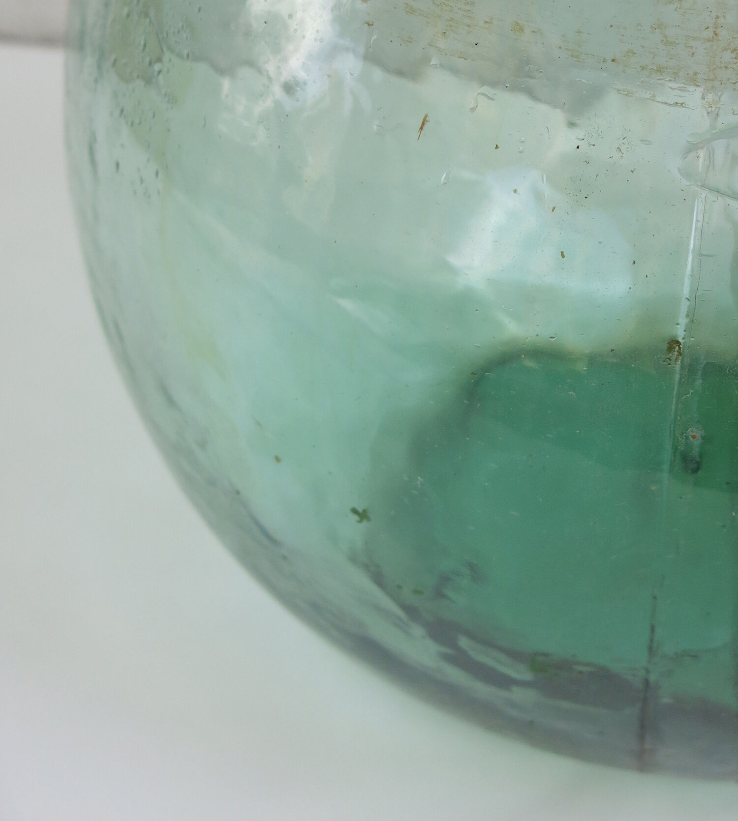Vintage glass demijohn