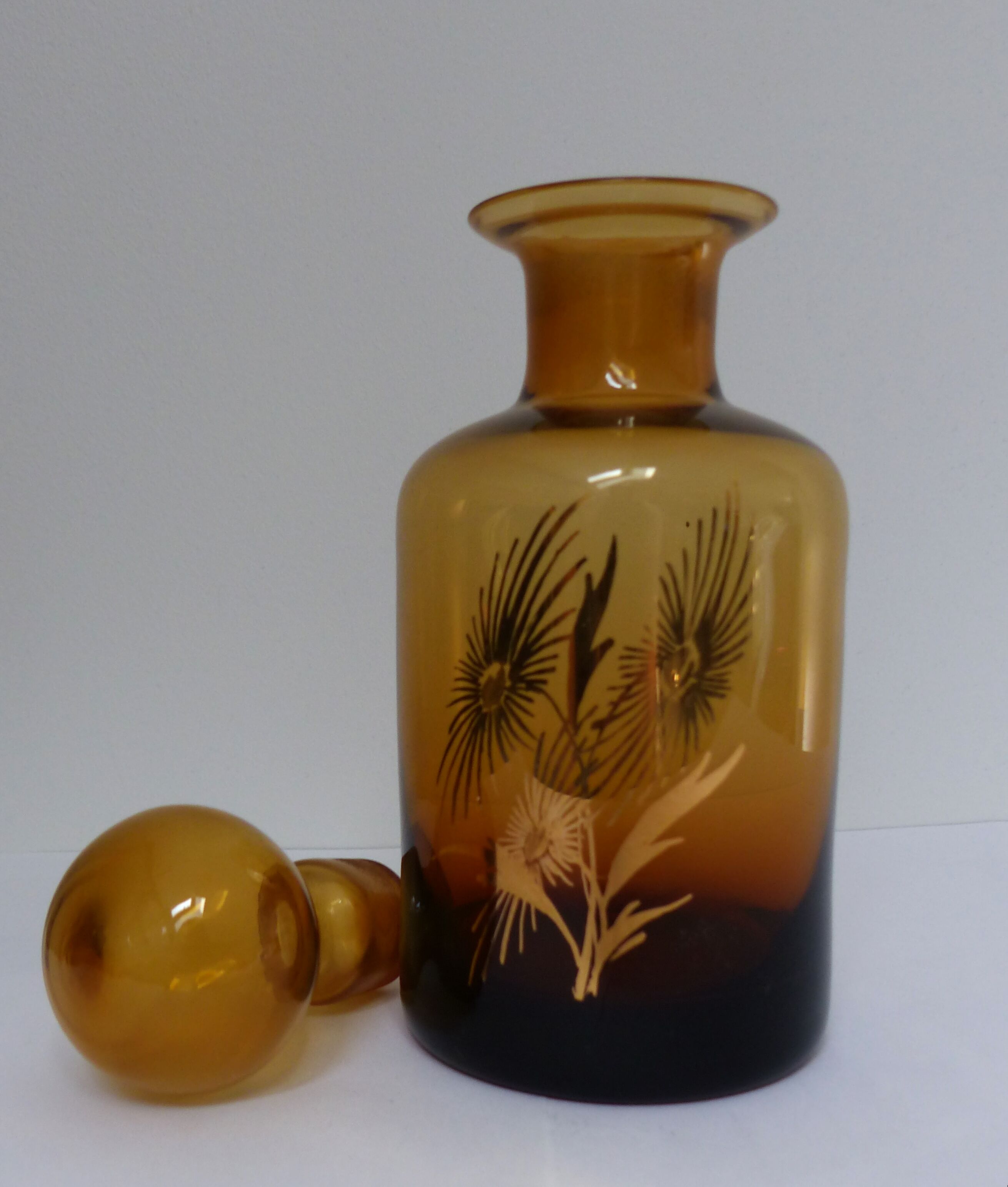 Decorated and signed perfume bottle, brown glass, painted "by hand Clary Paris"