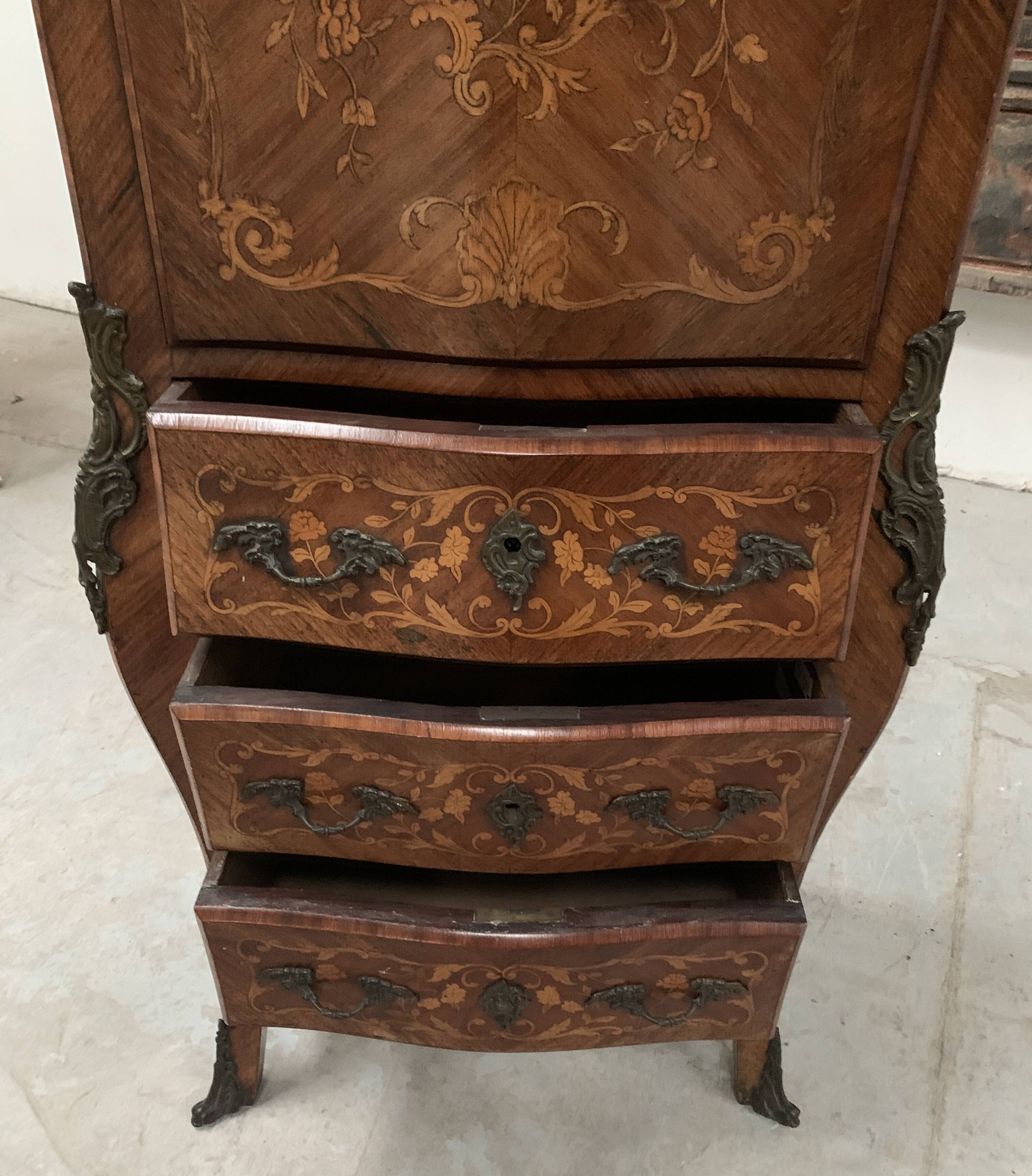 Louis XV style lady's secretary in light wood marquetry, 20th century.