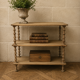 Natural wood display shelf with three tiers